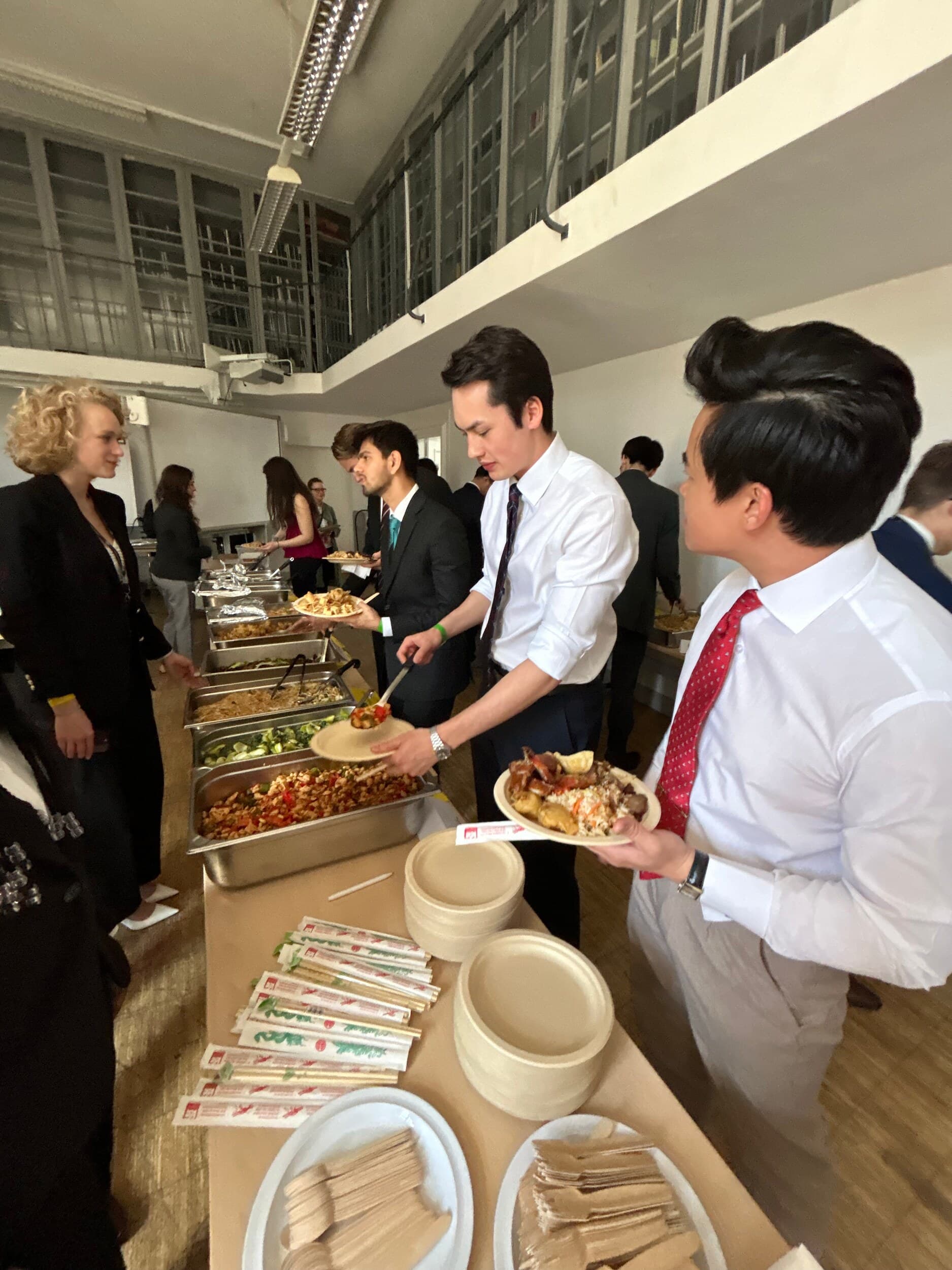 Delegates helping themselves at the lunch buffet